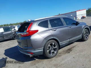 2017 Honda CR-V Touring with VIN 2HKRW1H91HH505686, listed as a IAAI auction lot 41805226 with 120,760 mi miles. Bid and sale history available at carsss.com. Image 4.