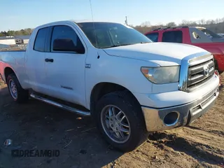 2010 Toyota Tundra z VIN 5TFRM5F10AX006754, wystawiony jako IAAI lot #41453862 z przebiegiem 225 706 mil mil oraz . Historia ofert i sprzedaży dostępna na DreamBid. Obrazek 1.