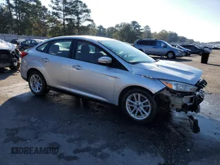 2017 Ford Focus SE with VIN 1FADP3F28HL315779, listed as a Copart auction lot 82608154 with 143,902 mi miles and Salvage title. Bid and sale history available at DreamBid. Image 4.