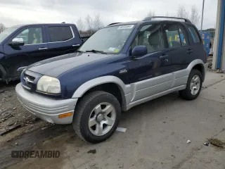 1999 Suzuki Grand Vitara JLX z VIN JS3TD62V0X4114050, wystawiony jako Copart lot #80593564 z przebiegiem Nie podano mil oraz Czysty tytuł • Clean title. Historia ofert i sprzedaży dostępna na DreamBid. Obrazek 1.