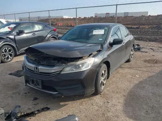 2016 Honda Accord Sedan LX with VIN 1HGCR2F33GA071196, listed as a IAAI auction lot 41520333 with 138,887 mi miles. Bid and sale history available at carsss.com. Image 2.
