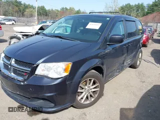 2014 Dodge Grand Caravan SXT with VIN 2C4RDGCGXER109690, listed as a IAAI auction lot 42133337 with 109,332 mi miles and . Bid and sale history available at DreamBid. Image 2.