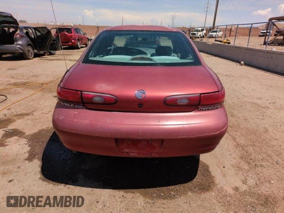 1997 Mercury Sable GS with VIN 1MELM50U2VA600052, listed as a Copart auction lot 58556795 with 65,848 mi miles and Salvage title. Bid and sale history available at DreamBid. Image 6.