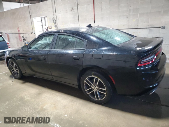 2019 Dodge Charger SXT with VIN 2C3CDXJG1KH757949, listed as a Copart auction lot 82231714 with 75,985 mi miles and Salvage Title. Bid and sale history available at DreamBid. Image 2.