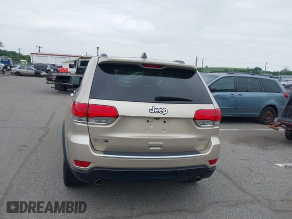 2014 Jeep Grand Cherokee Limited z VIN 1C4RJFBG8EC408754, wystawiony jako IAAI lot #42612211 z przebiegiem 149 017 mil mil oraz . Historia ofert i sprzedaży dostępna na DreamBid. Obrazek 16.