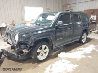 2014 Jeep Patriot Latitude with VIN 1C4NJRFBXED510937, listed as a IAAI auction lot 41577060 with 146,403 mi miles. Bid and sale history available at carsss.com. Image 16.