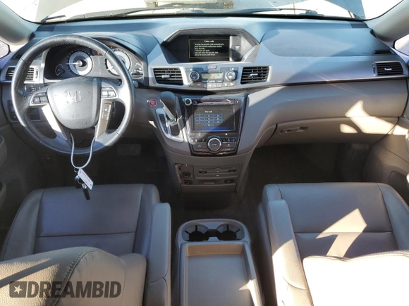2015 Honda Odyssey Touring Elite with VIN 5FNRL5H94FB037299, listed as a Copart auction lot 53886345 with 109,032 mi miles and Salvage Title. Bid and sale history available at DreamBid. Image 8.