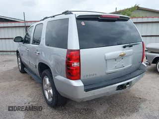 2011 Chevrolet Tahoe LT with VIN 1GNSCBE05BR190310, listed as a IAAI auction lot 42243623 with 249,453 mi miles and . Bid and sale history available at DreamBid. Image 3.