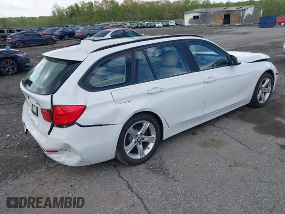 2014 BMW 3 Series 328i xDrive with VIN WBA3G7C55EKN37528, listed as a IAAI auction lot 42031076 with 55,627 mi miles and . Bid and sale history available at carsss.com. Image 4.