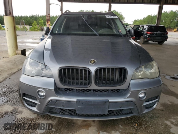 2012 BMW X5 35i with VIN 5UXZV4C56CL889802, listed as a Copart auction lot 62302265 with Not provided miles and Clean title. Bid and sale history available at DreamBid. Image 5.