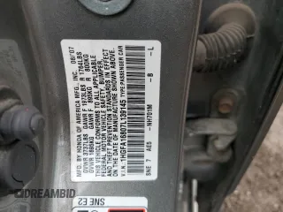 2007 Honda Civic EX with VIN 1HGFA16807L139145, listed as a Copart auction lot 52444095 with 217,422 mi miles and Salvage Title. Bid and sale history available at DreamBid. Image 14.