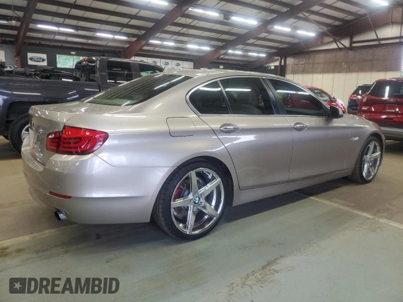 2013 BMW 5 Series 535i xDrive with VIN WBAFU7C57DDU74909, listed as a Copart auction lot 64053715 with 115,521 mi miles and Clean title. Bid and sale history available at DreamBid. Image 3.
