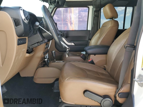 2016 Jeep Wrangler Unlimited Rubicon with VIN 1C4BJWFG9GL103312, listed as a Copart auction lot 52559465 with 79,692 mi miles and Salvage Title. Bid and sale history available at carsss.com. Image 7.
