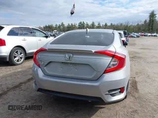 2018 Honda Civic EX-T z VIN 2HGFC1F34JH641837, wystawiony jako IAAI lot #41858089 z przebiegiem 65 318 mil mil oraz . Historia ofert i sprzedaży dostępna na DreamBid. Obrazek 16.