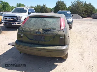 2006 Ford Focus S z VIN 1FAFP31N76W249134, wystawiony jako IAAI lot #41951073 z przebiegiem 152 065 mil mil oraz . Historia ofert i sprzedaży dostępna na DreamBid. Obrazek 16.