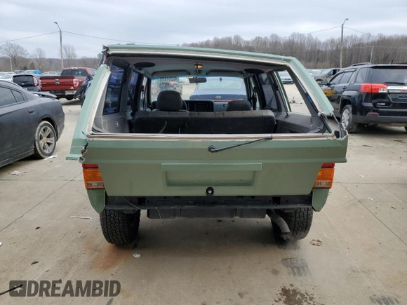 1996 Jeep Cherokee Country with VIN 1J4FJ78S3TL180304, listed as a Copart auction lot 45291925 with 162,876 mi miles and Salvage Title. Bid and sale history available at carsss.com. Image 6.