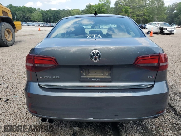 2017 Volkswagen Jetta SEL z VIN 3VWL17AJ9HM407735, wystawiony jako Copart lot #60257715 z przebiegiem 124 393 mil mil oraz Czysty tytuł • Clean title. Historia ofert i sprzedaży dostępna na DreamBid. Obrazek 6.