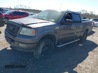 2004 Ford F-150 XLT with VIN 1FTPW14504KA75025, listed as a IAAI auction lot 41794581 with 213,022 mi miles. Bid and sale history available at carsss.com. Image 2.