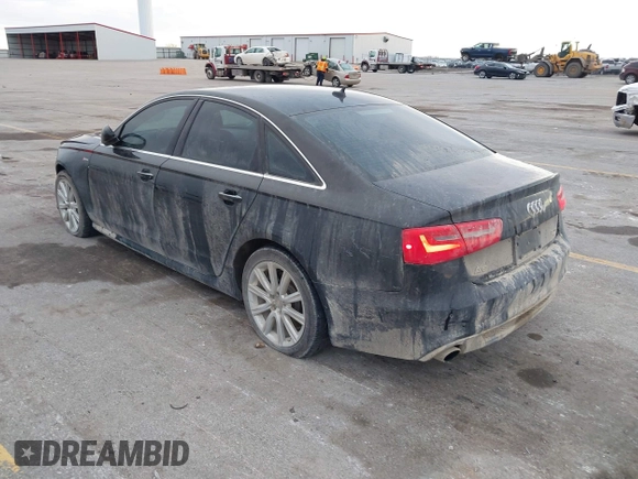 2013 Audi A6 3.0T Prestige with VIN WAUHGAFC3DN061788, listed as a IAAI auction lot 41129245 with 137,575 mi miles. Bid and sale history available at carsss.com. Image 3.