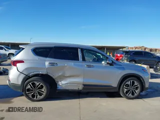 2020 Hyundai Santa Fe Limited with VIN 5NMS53AA6LH301900, listed as a IAAI auction lot 41295933 with 92,359 mi miles and . Bid and sale history available at DreamBid. Image 14.