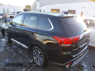 2020 Mitsubishi Outlander SE with VIN JA4AD3A31LZ043310, listed as a IAAI auction lot 41270274 with 141,924 mi miles and . Bid and sale history available at DreamBid. Image 3.