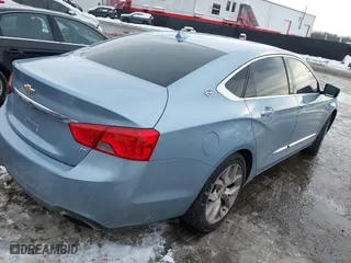 2014 Chevrolet Impala LTZ with VIN 1G1145SL0EU132598, listed as a IAAI auction lot 41264394 with 84,783 mi miles. Bid and sale history available at carsss.com. Image 4.