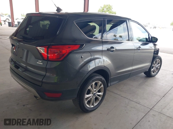 2019 Ford Escape SE with VIN 1FMCU0GD9KUB79835, listed as a IAAI auction lot 42014806 with 130,324 mi miles. Bid and sale history available at carsss.com. Image 4.