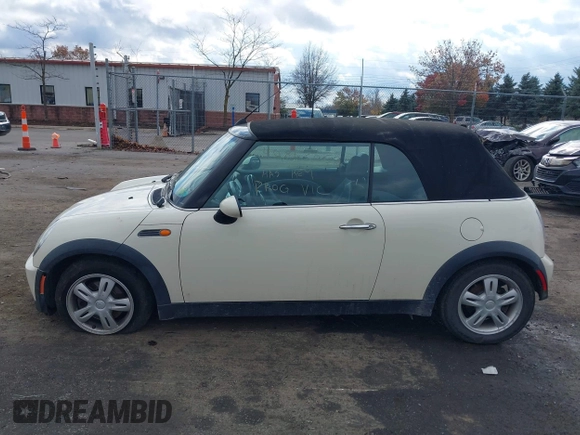 2006 MINI Convertible with VIN WMWRF33566TF65410, listed as a IAAI auction lot 40813052 with 131,109 mi miles and . Bid and sale history available at DreamBid. Image 14.