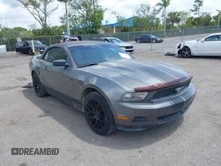 2010 Ford Mustang V6 with VIN 1ZVBP8EN1A5178265, listed as a IAAI auction lot 42107186 with 143,556 mi miles. Bid and sale history available at carsss.com. Image 1.