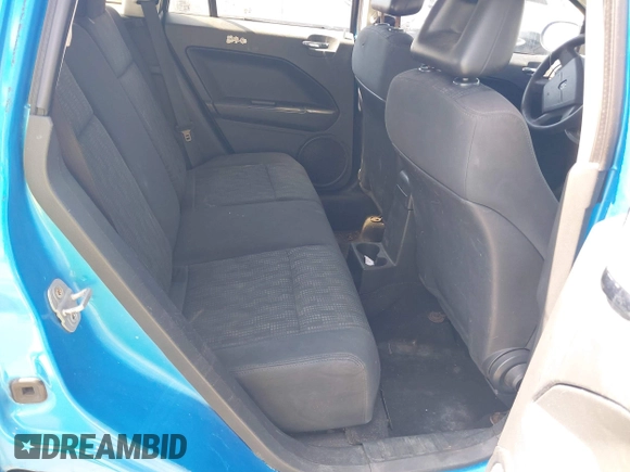 2008 Dodge Caliber SE with VIN 1B3HB28B88D677348, listed as a IAAI auction lot 42130383 with 217,564 mi miles. Bid and sale history available at carsss.com. Image 8.