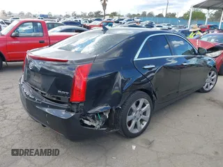 2013 Cadillac ATS z VIN 1G6AA5RX9D0167867, wystawiony jako IAAI lot #41945699 z przebiegiem 166 040 mil mil oraz . Historia ofert i sprzedaży dostępna na DreamBid. Obrazek 4.