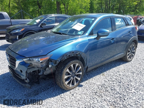 2019 Mazda CX-3 Touring z VIN JM1DKFC72K1459583, wystawiony jako IAAI lot #42380694 z przebiegiem 13 846 mil mil oraz . Historia ofert i sprzedaży dostępna na DreamBid. Obrazek 2.