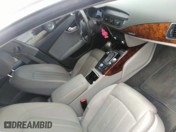 2013 Audi A7 Prestige with VIN WAU2GAFC0DN075637, listed as a IAAI auction lot 42710903 with 145,562 mi miles and . Bid and sale history available at DreamBid. Image 5.