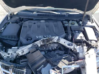 2013 Cadillac XTS Premium z VIN 2G61S5S34D9201773, wystawiony jako Copart lot #48572365 z przebiegiem 78 296 mil mil oraz Szkoda całkowita • Salvage title. Historia ofert i sprzedaży dostępna na DreamBid. Obrazek 11.