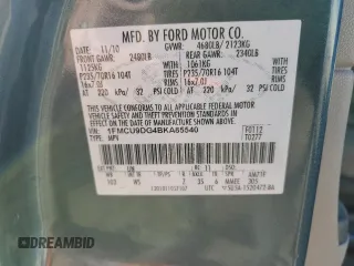 2011 Ford Escape XLT z VIN 1FMCU9DG4BKA85540, wystawiony jako Copart lot #50682125 z przebiegiem 183 747 mil mil oraz Czysty tytuł • Clean title. Historia ofert i sprzedaży dostępna na DreamBid. Obrazek 13.