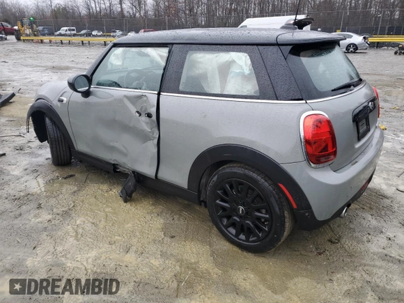 2021 MINI Hardtop Cooper with VIN WMWXR3C04M2N98103, listed as a Copart auction lot 42589255 with 61,317 mi miles and Salvage title. Bid and sale history available at DreamBid. Image 2.