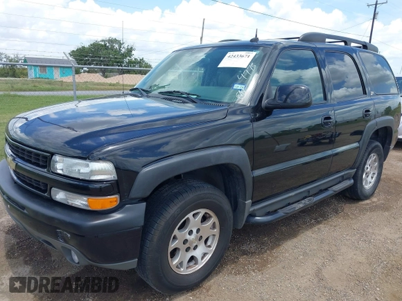 2004 Chevrolet Tahoe Z71 with VIN 1GNEK13ZX4R184775, listed as a IAAI auction lot 42433671 with 77,019 mi miles and . Bid and sale history available at DreamBid. Image 6.