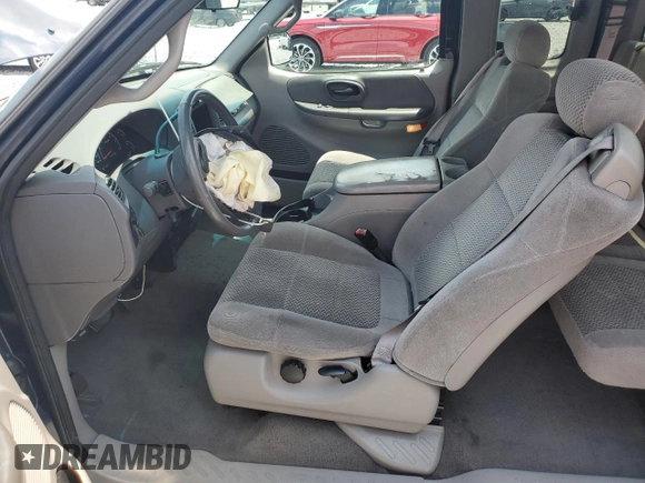 2002 Ford F-150 XL with VIN 1FTRX17222KB05081, listed as a Copart auction lot 56459765 with 126,941 mi miles and Salvage title. Bid and sale history available at DreamBid. Image 7.