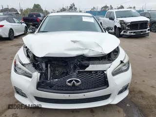 2015 Infiniti Q50 Premium z VIN JN1BV7AP2FM344044, wystawiony jako IAAI lot #42217012 z przebiegiem 155 714 mil mil oraz . Historia ofert i sprzedaży dostępna na DreamBid. Obrazek 12.