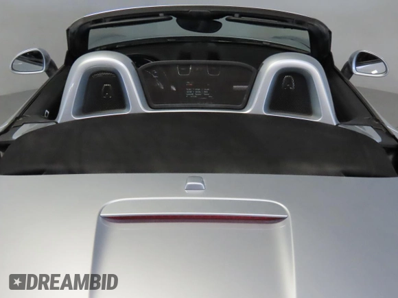 2014 Porsche Boxster with VIN WP0CA2A83ES120705, listed as a Copart auction lot 63518515 with 65,603 mi miles and Salvage title. Bid and sale history available at DreamBid. Image 6.
