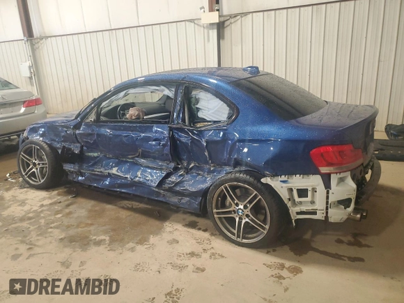 2013 BMW 1 Series 135i with VIN WBAUC9C51DVY60421, listed as a Copart auction lot 52700235 with 90,837 mi miles and Salvage Title. Bid and sale history available at carsss.com. Image 2.