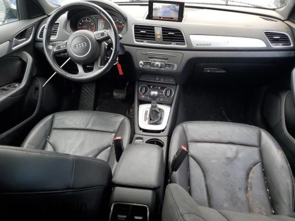 2017 Audi Q3 Premium z VIN WA1ECCFS5HR001606, wystawiony jako Copart lot #58276485 z przebiegiem 93 037 mil mil oraz Tytuł czysty. Historia ofert i sprzedaży dostępna na DreamBid. Obrazek 8.