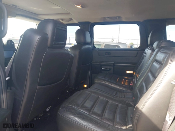 2005 Hummer H2 SUV with VIN 5GRGN23U05H128420, listed as a IAAI auction lot 41983395 with 194,925 mi miles. Bid and sale history available at carsss.com. Image 8.