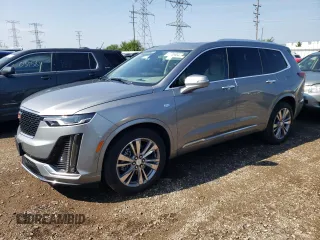 2024 Cadillac XT6 FWD Premium Luxury with VIN 1GYKPCRS7RZ736818, listed as a Copart auction lot 67768804 with 7,145 mi miles and Salvage Title. Bid and sale history available at carsss.com. Image 1.