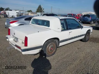 1989 Cadillac Eldorado with VIN 1G6EL1150KU621587, listed as a IAAI auction lot 42103841 with 129,711 mi miles and . Bid and sale history available at DreamBid. Image 4.