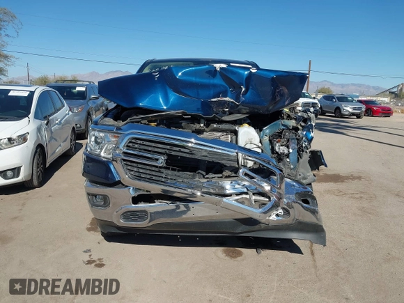 2019 Ram 1500 Big Horn z VIN 1C6RREFT4KN769061, wystawiony jako IAAI lot #41356744 z przebiegiem Nie podano mil oraz . Historia ofert i sprzedaży dostępna na DreamBid. Obrazek 12.
