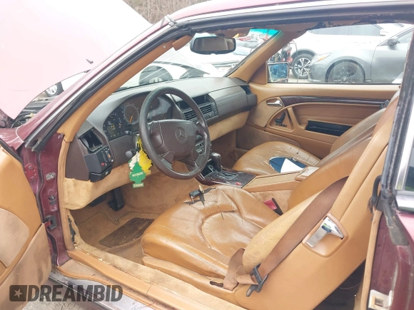1997 Mercedes-Benz SL-Class with VIN WDBFA67F3VF142320, listed as a IAAI auction lot 41835593 with 172,151 mi miles. Bid and sale history available at carsss.com. Image 5.