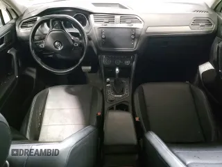 2018 Volkswagen Tiguan SEL with VIN 3VV2B7AX9JM065985, listed as a Copart auction lot 79404694 with Not provided miles and Salvage title. Bid and sale history available at DreamBid. Image 8.