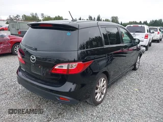 2012 Mazda 5 Grand Touring with VIN JM1CW2DL9C0112005, listed as a IAAI auction lot 42680646 with 140,724 mi miles and . Bid and sale history available at DreamBid. Image 4.