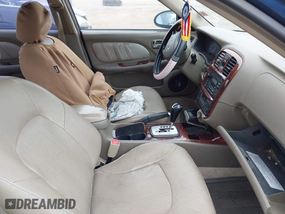 2004 Hyundai Sonata GLS with VIN KMHWF35H44A081671, listed as a IAAI auction lot 41788873 with 999,999 mi miles. Bid and sale history available at carsss.com. Image 5.